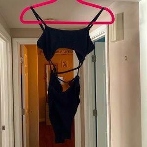 black cutout cross bodysuit